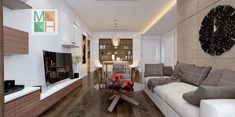 Mẫu thiết kế phòng khách hiện đại với cách bố trí đồ nội thất khoa học hợp lí sử dụng các tủ gỗ đa năng vừa đảm bảo tính thẩm mỹ vừa mang lại sự thuận tiện cho gia chủ. Thiết kế chung cư